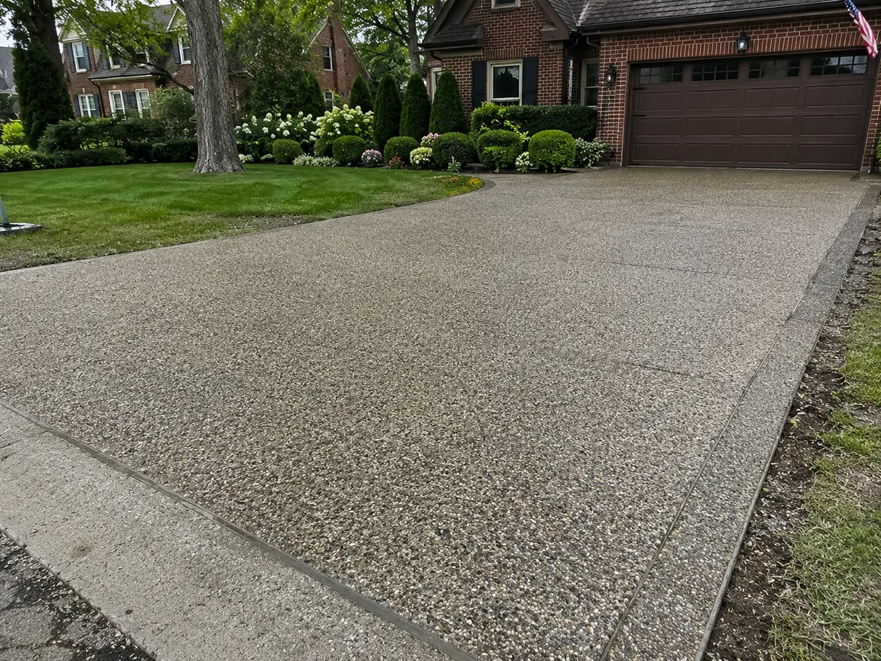 Exposed aggregate driveway with brick colonial home in Grosse Pointe, MI